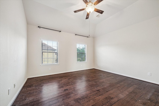2707 Kings Retreat Cir, Kingwood, TX 77345 - spare room featuring a ceiling fan, dark wood-style flooring, visible vents, vaulted ceiling, and baseboards