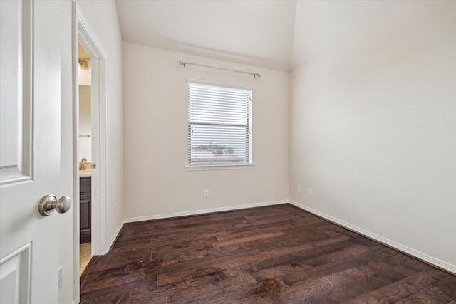 2707 Kings Retreat Cir, Kingwood, TX 77345 - unfurnished room with baseboards, vaulted ceiling, and wood finished floors