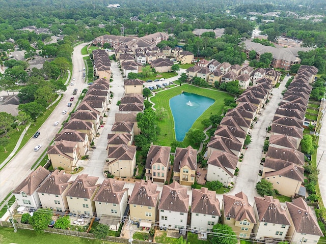 2707 Kings Retreat Cir, Kingwood, TX 77345 - drone / aerial view featuring a residential view and a water view