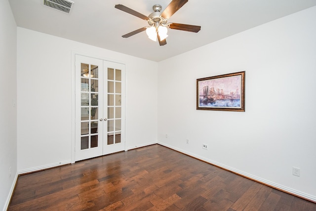 empty room featuring ceiling fan, french doors, visible vents, baseboards, and dark wood-type flooring