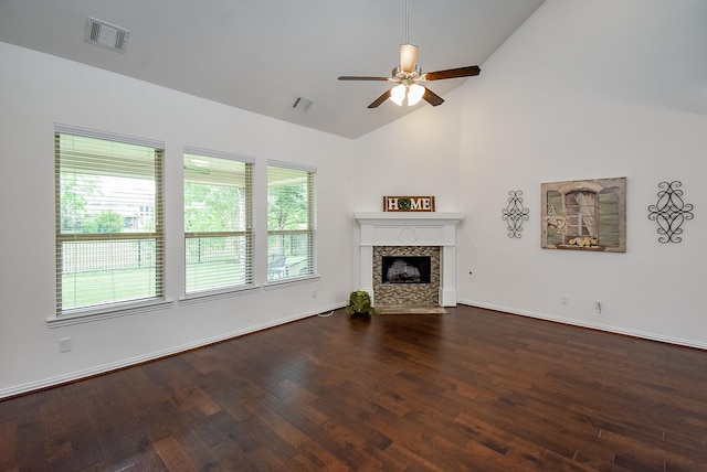 unfurnished living room featuring a fireplace with flush hearth, ceiling fan, wood finished floors, and visible vents
