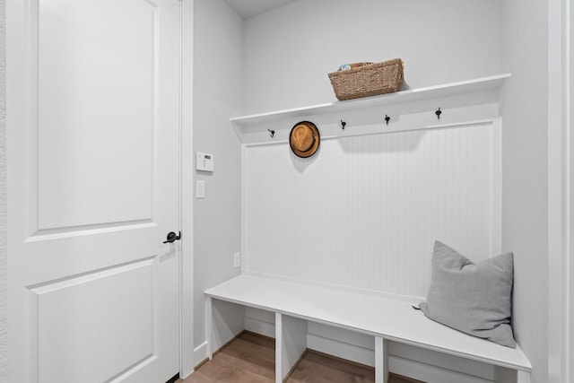 mudroom with light wood-style floors