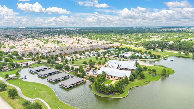 bird's eye view featuring a water view and a residential view