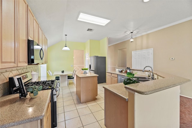 kitchen featuring a kitchen island with sink, stainless steel appliances, light brown cabinetry, and light tile patterned flooring