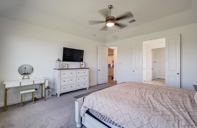 carpeted bedroom featuring visible vents, a ceiling fan, and baseboards