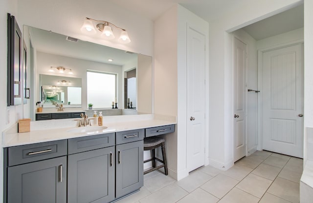 full bathroom with tile patterned floors, vanity, and visible vents