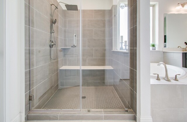 19018 Valentine Padlock Cir, Tomball, TX 77377 - bathroom featuring a stall shower, a bath, and vanity