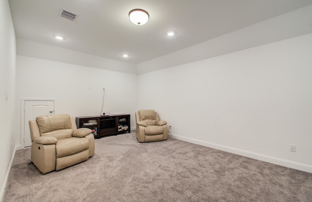 sitting room featuring carpet flooring, recessed lighting, baseboards, and visible vents