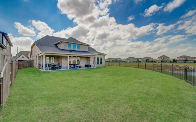 19018 Valentine Padlock Cir, Tomball, TX 77377 - back of house with a patio and brick siding
