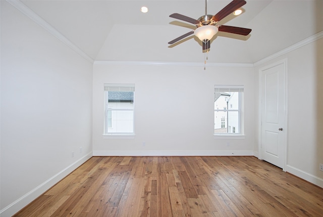 9443 Fannin St, Houston, TX 77045 - spare room featuring healthy amount of natural light, light wood-style flooring, a ceiling fan, lofted ceiling, and baseboards