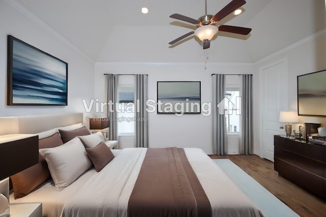 bedroom featuring multiple windows, recessed lighting, and wood finished floors