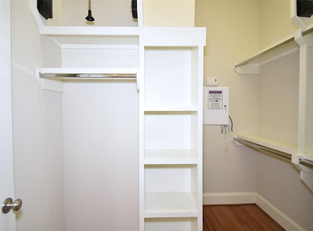 9443 Fannin St, Houston, TX 77045 - spacious closet featuring wood finished floors