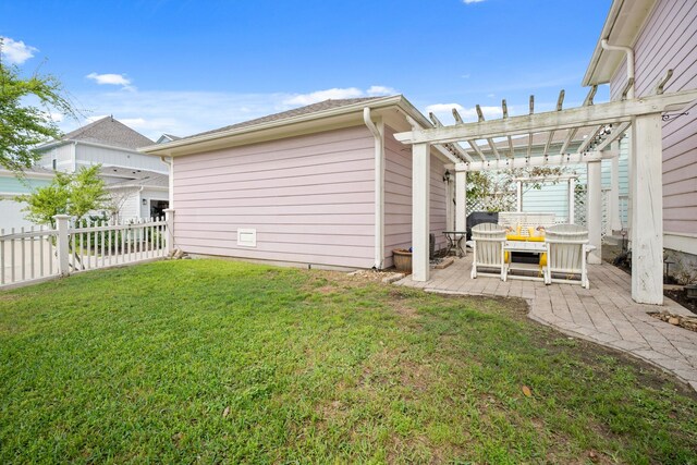 8 Latitude Ln, Galveston, TX 77554 - view of yard with a pergola, fence, and a patio