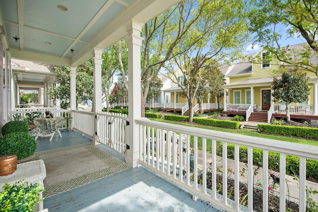 8 Latitude Ln, Galveston, TX 77554 - balcony featuring covered porch