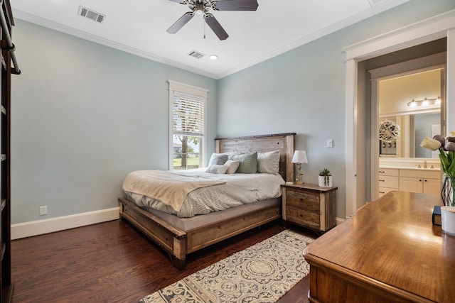 8 Latitude Ln, Galveston, TX 77554 - bedroom featuring visible vents, a sink, dark wood-style flooring, and crown molding