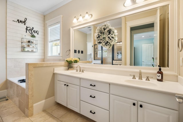 8 Latitude Ln, Galveston, TX 77554 - bathroom featuring double vanity, ornamental molding, a sink, and tile patterned flooring