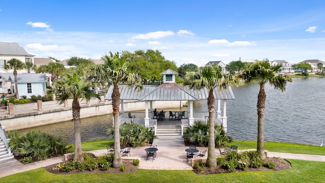 8 Latitude Ln, Galveston, TX 77554 - exterior space featuring a water view, a gazebo, a residential view, and a patio area