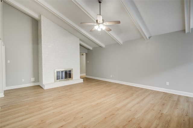 2706 Williams Grant St, Sugar Land, TX 77479 - unfurnished living room featuring baseboards, vaulted ceiling with beams, a ceiling fan, and light wood finished floors