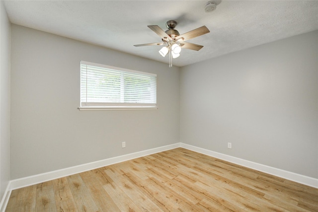 2706 Williams Grant St, Sugar Land, TX 77479 - empty room featuring baseboards, ceiling fan, and wood finished floors