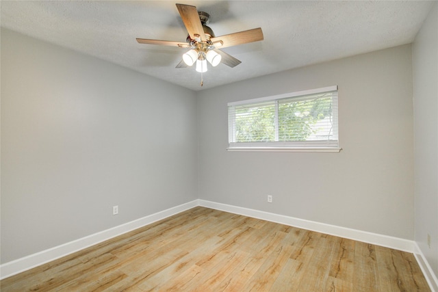 2706 Williams Grant St, Sugar Land, TX 77479 - unfurnished room featuring baseboards, ceiling fan, and wood finished floors