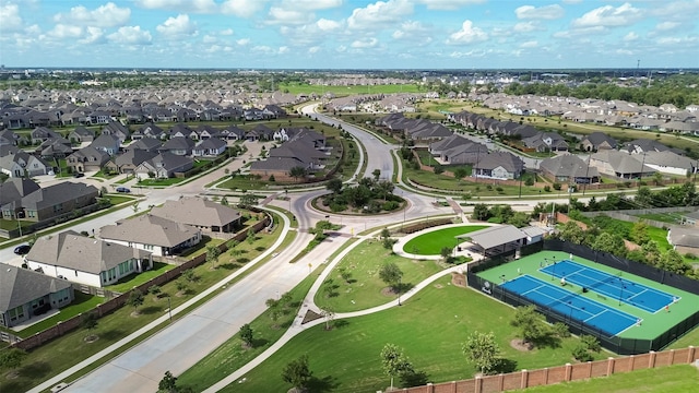 birds eye view of property with a residential view