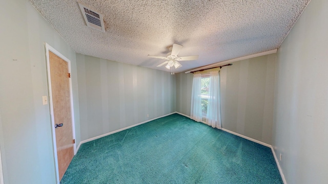 spare room with visible vents, baseboards, a textured ceiling, a ceiling fan, and carpet
