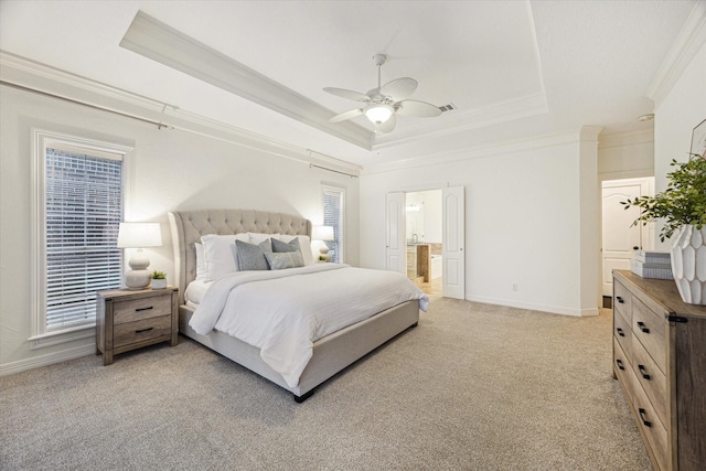 bedroom with crown molding, a raised ceiling, baseboards, and light colored carpet