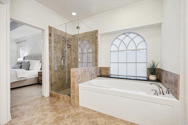 bathroom featuring crown molding, connected bathroom, tile patterned floors, a garden tub, and a stall shower