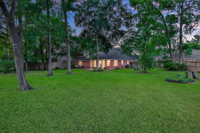 view of yard featuring a fenced backyard