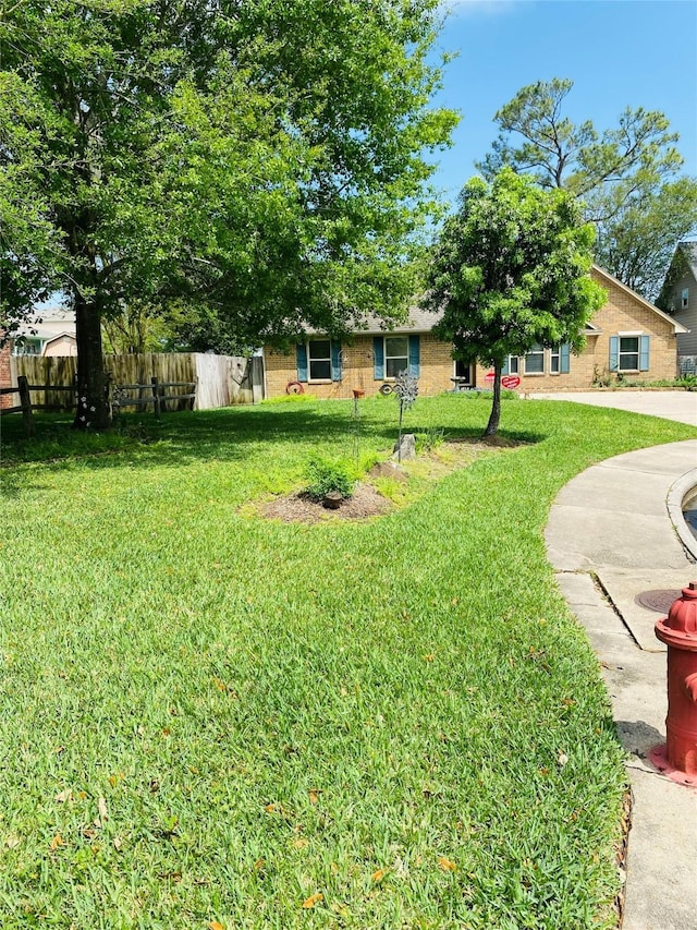 view of yard featuring fence