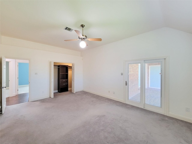 unfurnished bedroom with visible vents, baseboards, access to outside, and light carpet