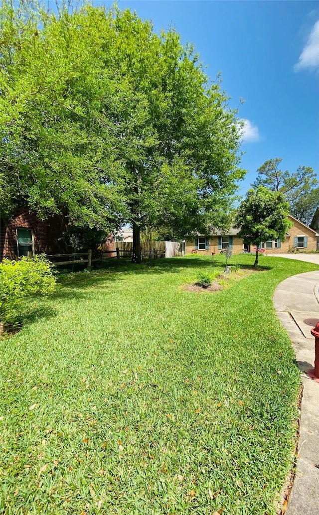 view of yard featuring fence