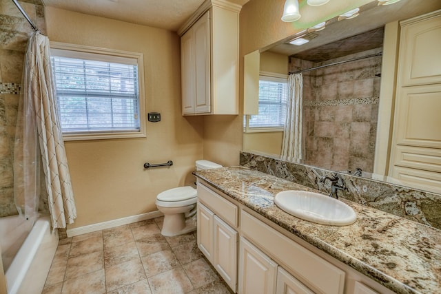 bathroom featuring tile patterned flooring, vanity, toilet, shower / bathtub combination with curtain, and baseboards