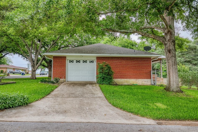 garage with concrete driveway