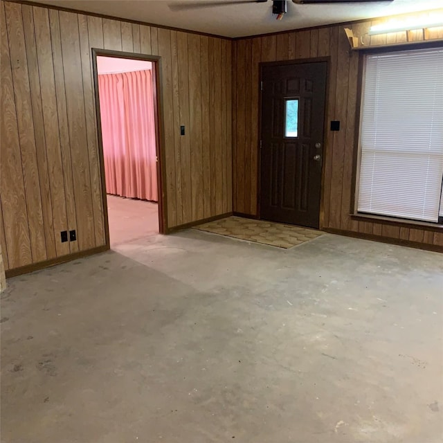 169 Lakeview Pnes, Livingston, TX 77351 - foyer entrance with wood walls and concrete floors