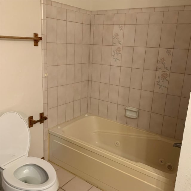 169 Lakeview Pnes, Livingston, TX 77351 - full bath featuring toilet, tile patterned floors, and a combined bath / shower with jetted tub