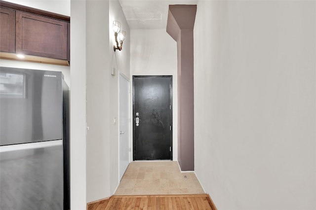 hallway with light wood-style flooring