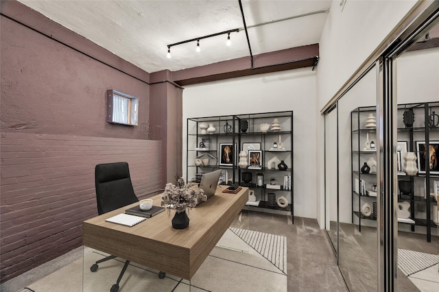 office with brick wall