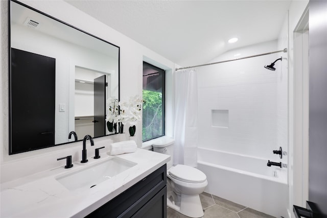 full bath with visible vents, tile patterned flooring, shower / tub combo, vanity, and toilet