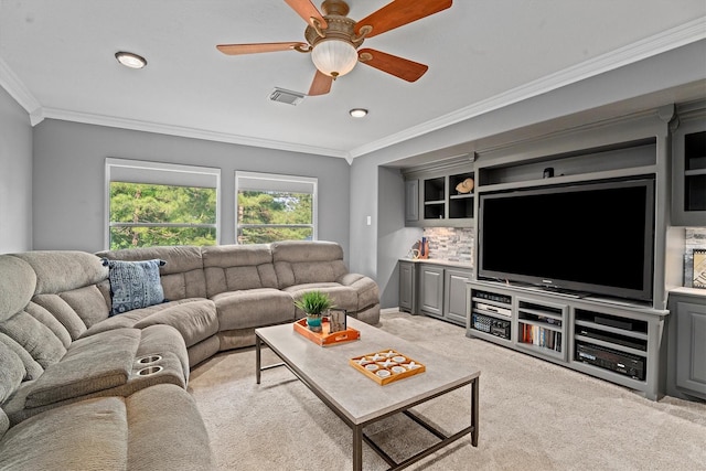 living area with visible vents, crown molding, recessed lighting, light colored carpet, and a ceiling fan
