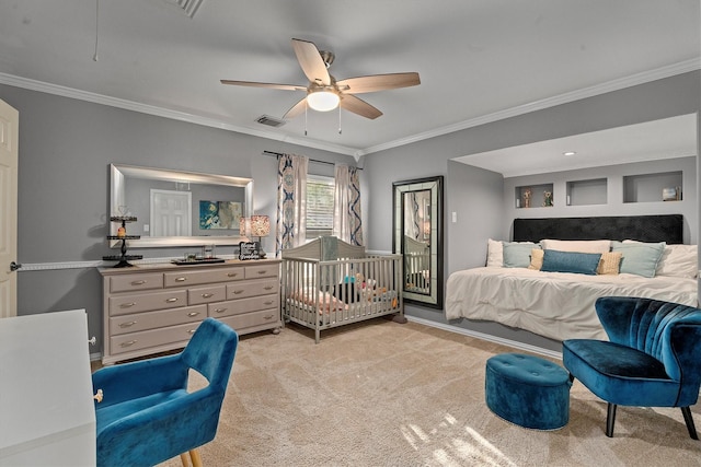 bedroom featuring ceiling fan, light colored carpet, crown molding, visible vents, and baseboards