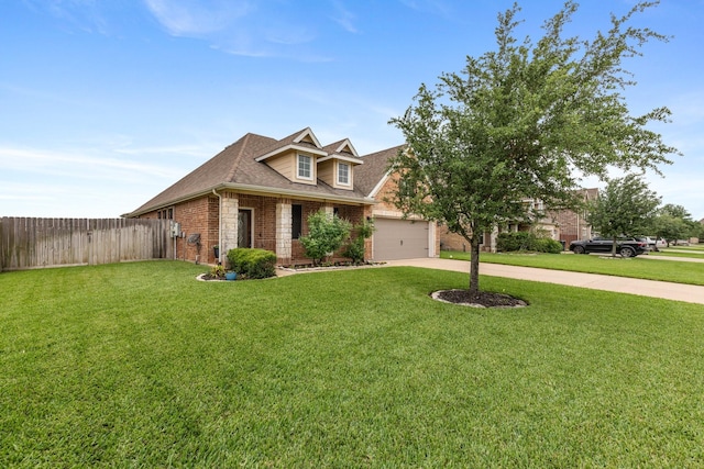 view of front facade featuring brick siding, fence, driveway, and a front yard
