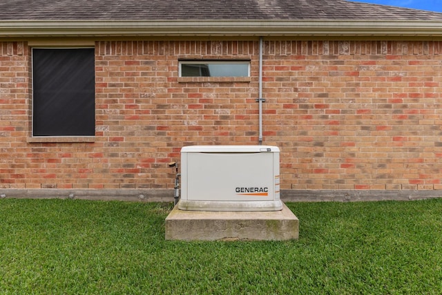 exterior details featuring brick siding and a power unit
