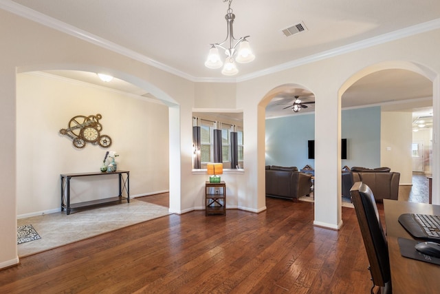 dining room with visible vents, crown molding, arched walkways, wood-type flooring, and ceiling fan with notable chandelier