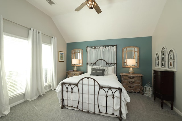 bedroom featuring vaulted ceiling, carpet flooring, baseboards, and a ceiling fan