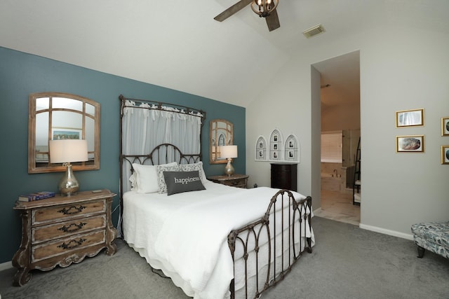 carpeted bedroom with vaulted ceiling, baseboards, ensuite bathroom, and a ceiling fan