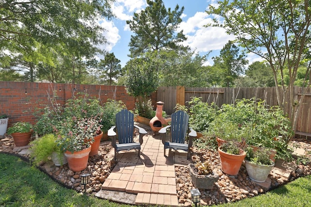 view of patio with a fenced backyard
