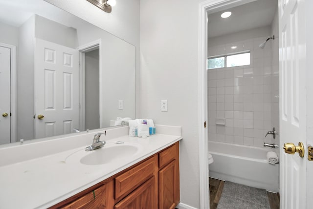 8102 Rhobell St, Houston, TX 77078 - bathroom with vanity, toilet, and shower / tub combination