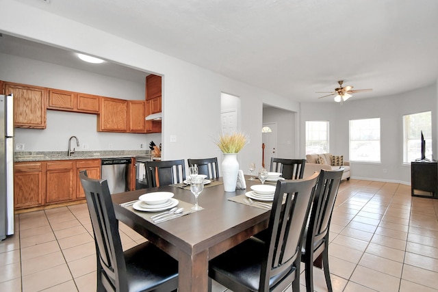8102 Rhobell St, Houston, TX 77078 - dining room featuring a ceiling fan and light tile patterned floors