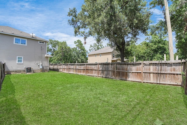 8102 Rhobell St, Houston, TX 77078 - view of yard featuring cooling unit and a fenced backyard